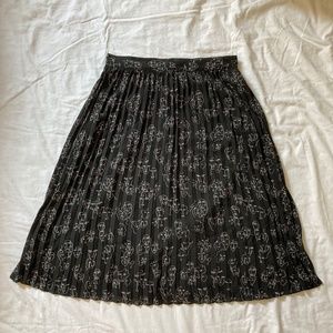 a new day Abstract Face Pleated Skirt